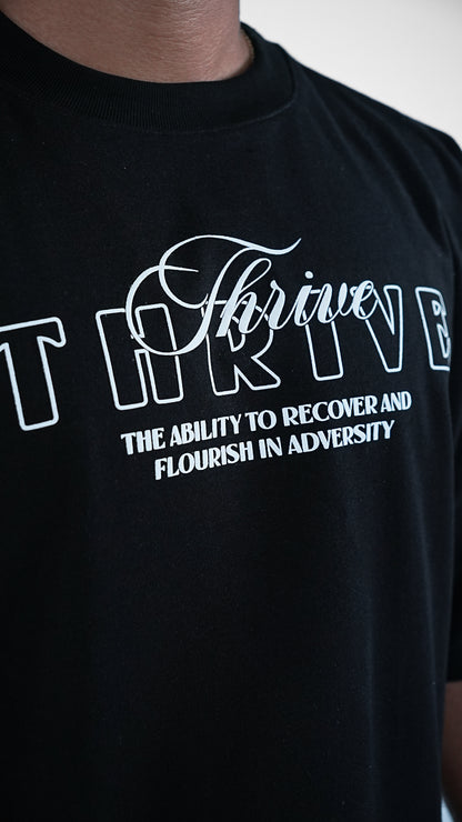 CAMISETA NEGRA OVERSIZE THRIVE